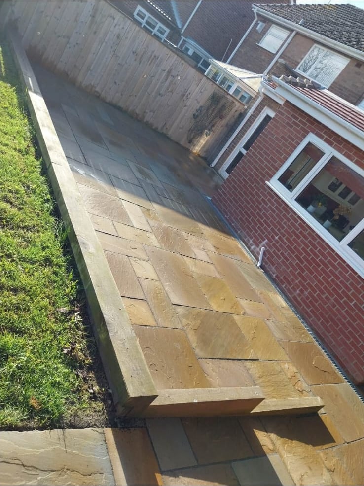 Sandstone patio path laid by Ashurst and Sons Roofing